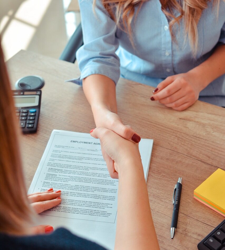 Woman offer Handshake to seal a deal after a job recruitment meeting